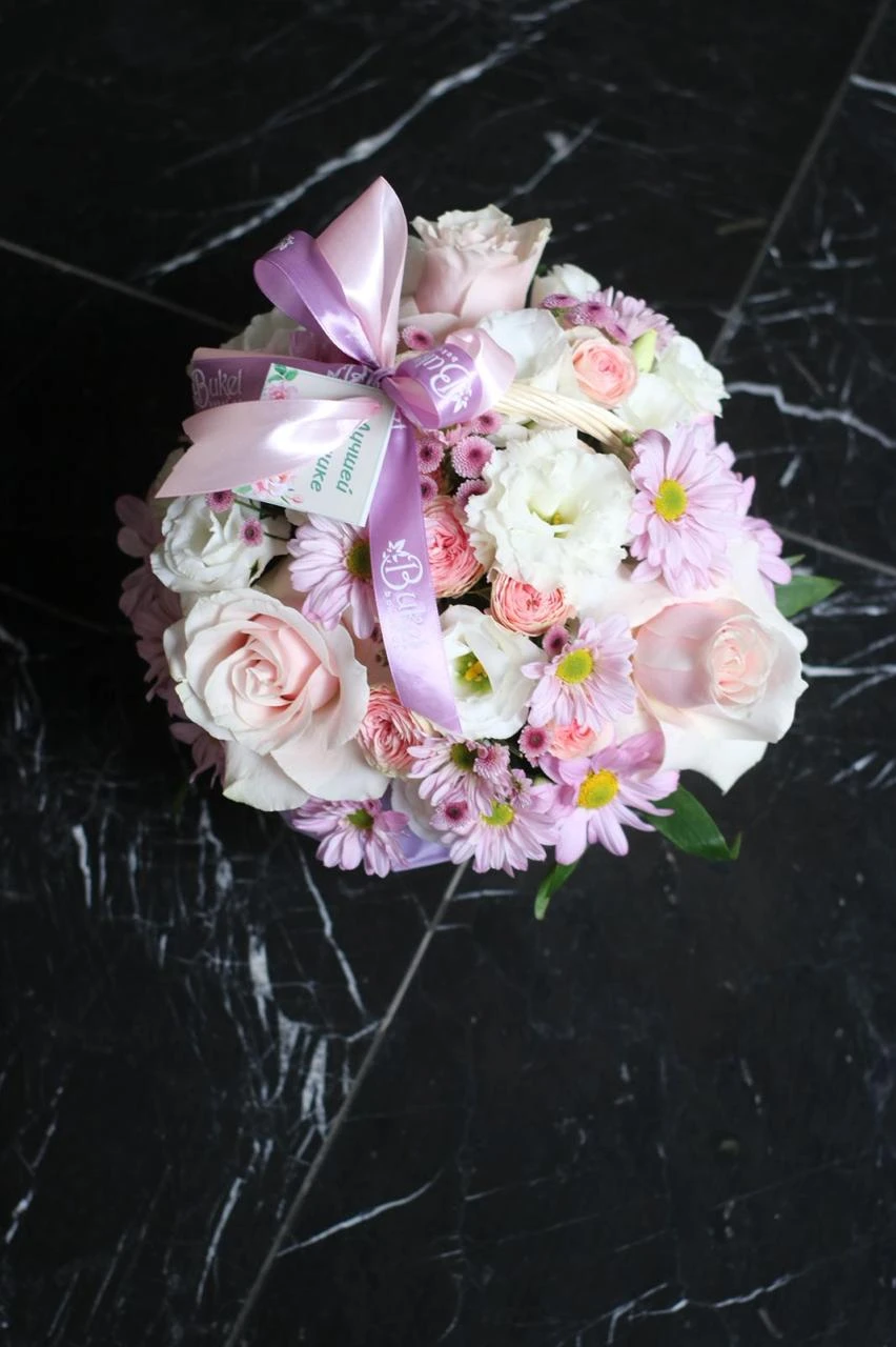 Roses and daisies in a box