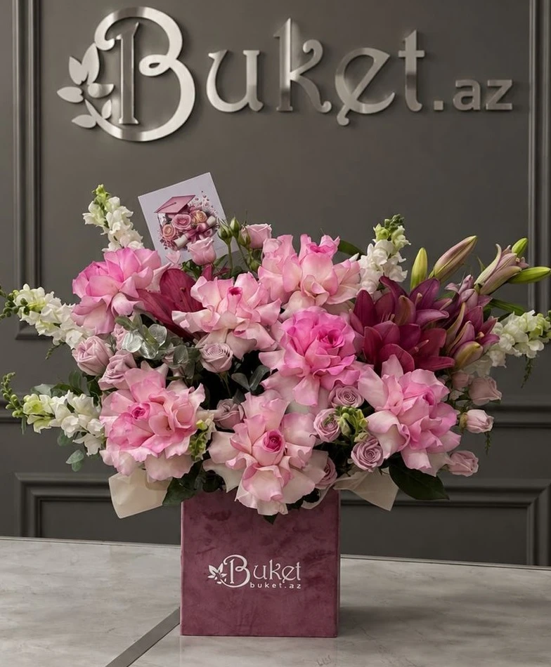 Graduation composition of mixed flowers